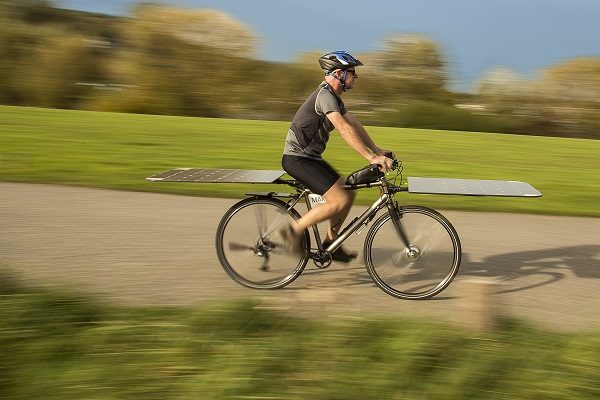 Maxun One solar e-bike, riding shot, right