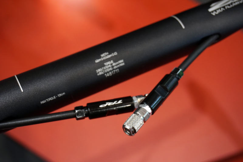 TRP TT Hydro hydraulic disc brakes with quick disconnect hoses for easy bike packing on triathlon bikes
