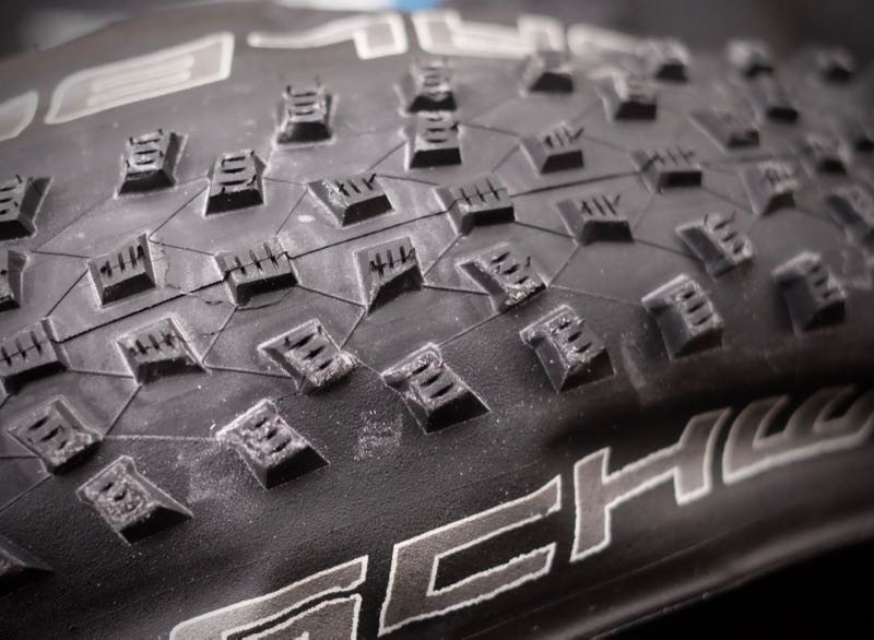Tire designers have to use many methods to reinforce tread features to endure ride forces.