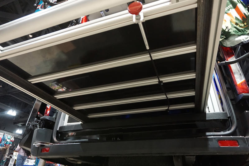 VanDOit custom Ford Transit adventure van with slide out bike rack