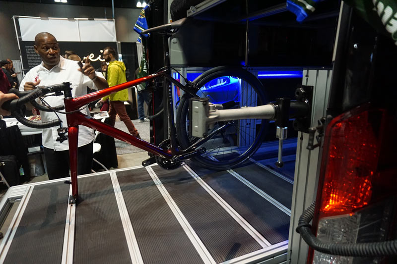 VanDOit custom Ford Transit adventure van with slide out bike rack and integrated work stand