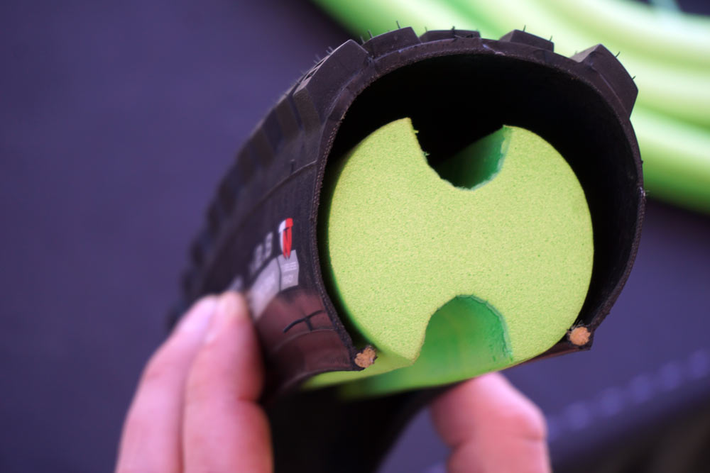 vittoria air liner tire insert for mountain bikes lets you run lower tire pressure and protects against pinch flats