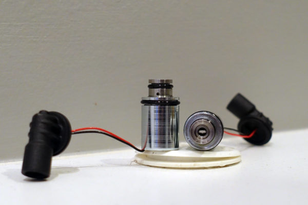 Fox Live Valve latching solenoid uses a magnetically activated needle to open and close the high speed compression damping port