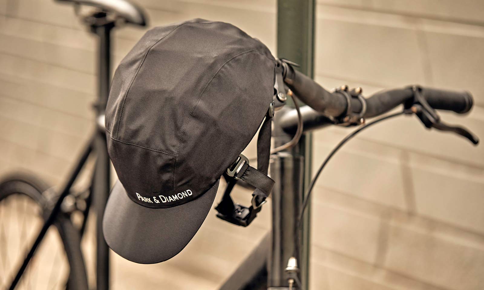 Park & Diamond hides helmet in a baseball cap, collapses it to the size of a bottle