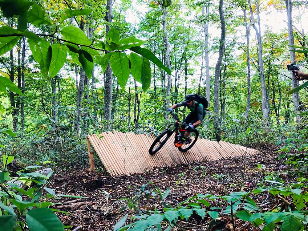 mountain biking nozawa snow resort bike park during summer green season