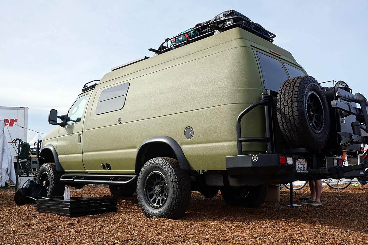 sportsmobile full size van with orange peel paint and lift kit for offroad camping