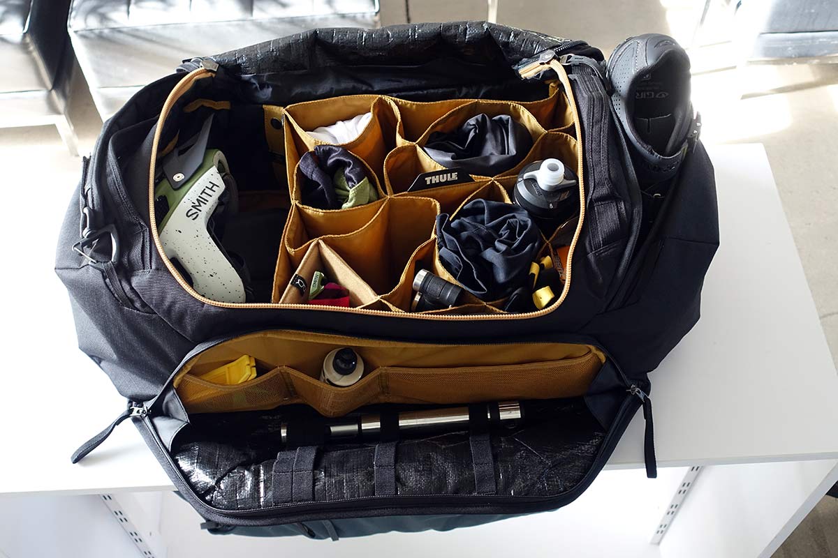 The Thule RoundTrip Duffle bag stores several days worth of riding clothes helmet shoes and gear so you can commute to work and still ride road and mountain bikes after work
