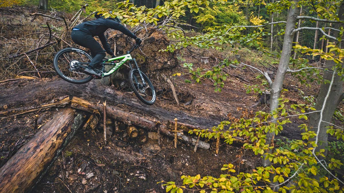 2021 Canyon Spectral 29 CF trail bike, lightweight carbon 150mm all-mountain bike, photo by Roo Fowler, log jump