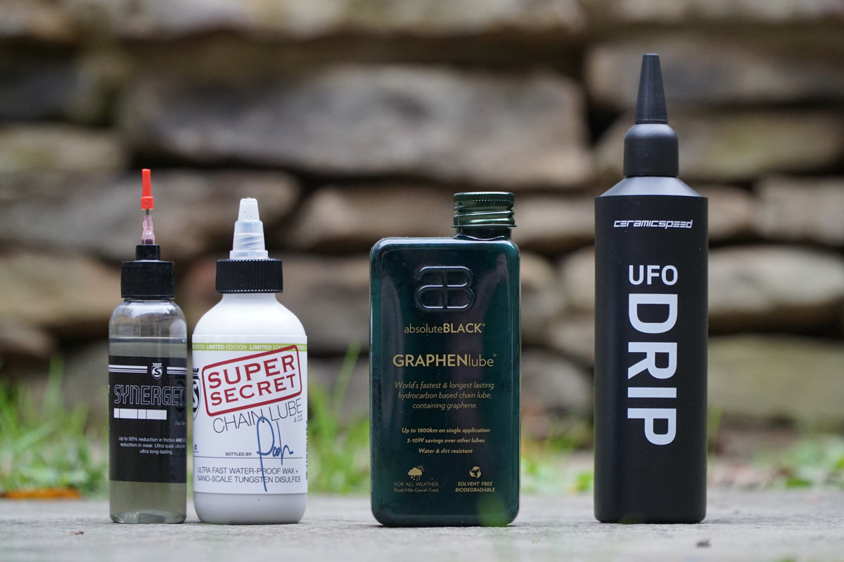 the best wax chain lubes for cyclists - silca super secret chain lube - absoluteblack graphenlube - ceramicspeed ufo drip