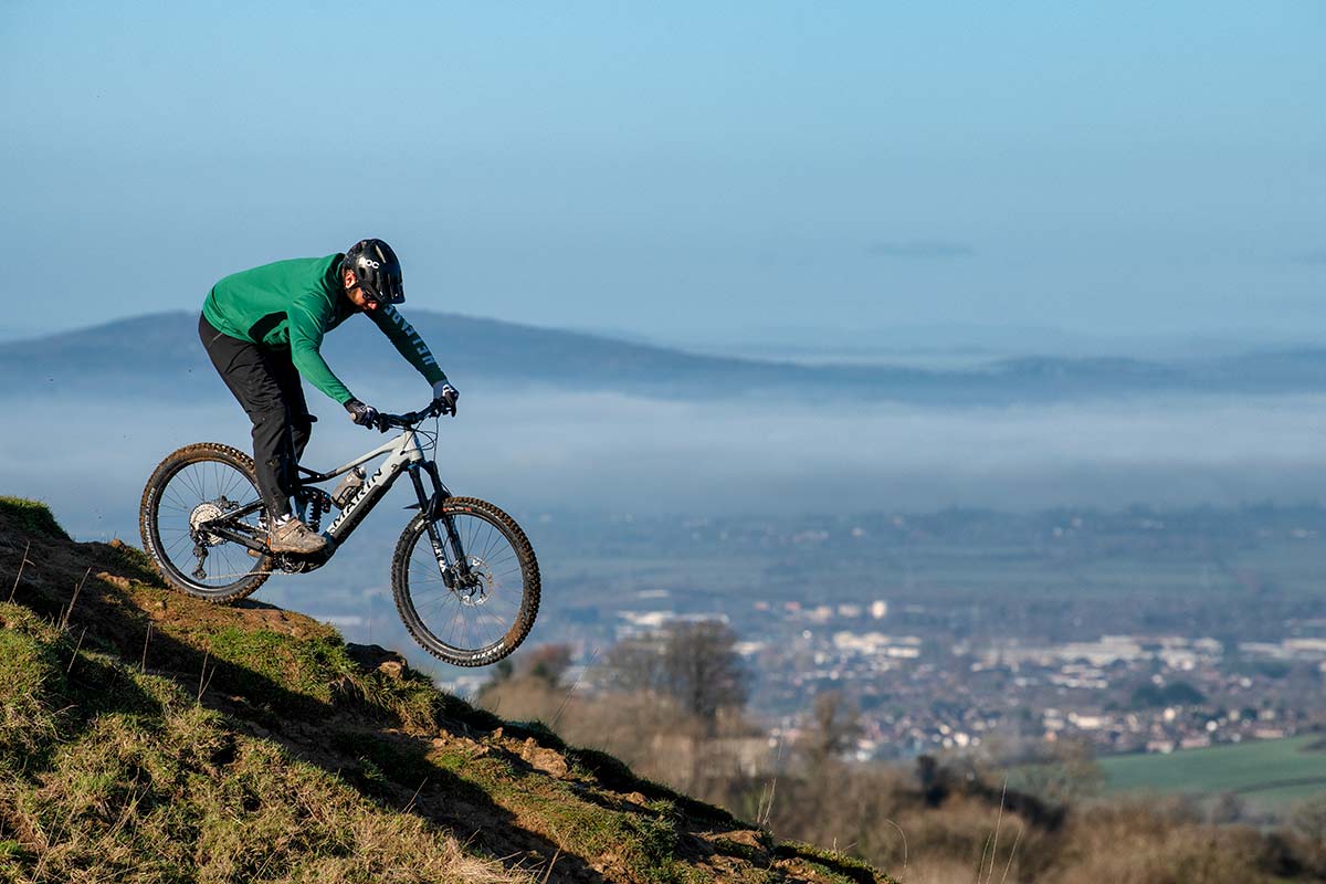 marin alpine trail ebike action shot city backdrop