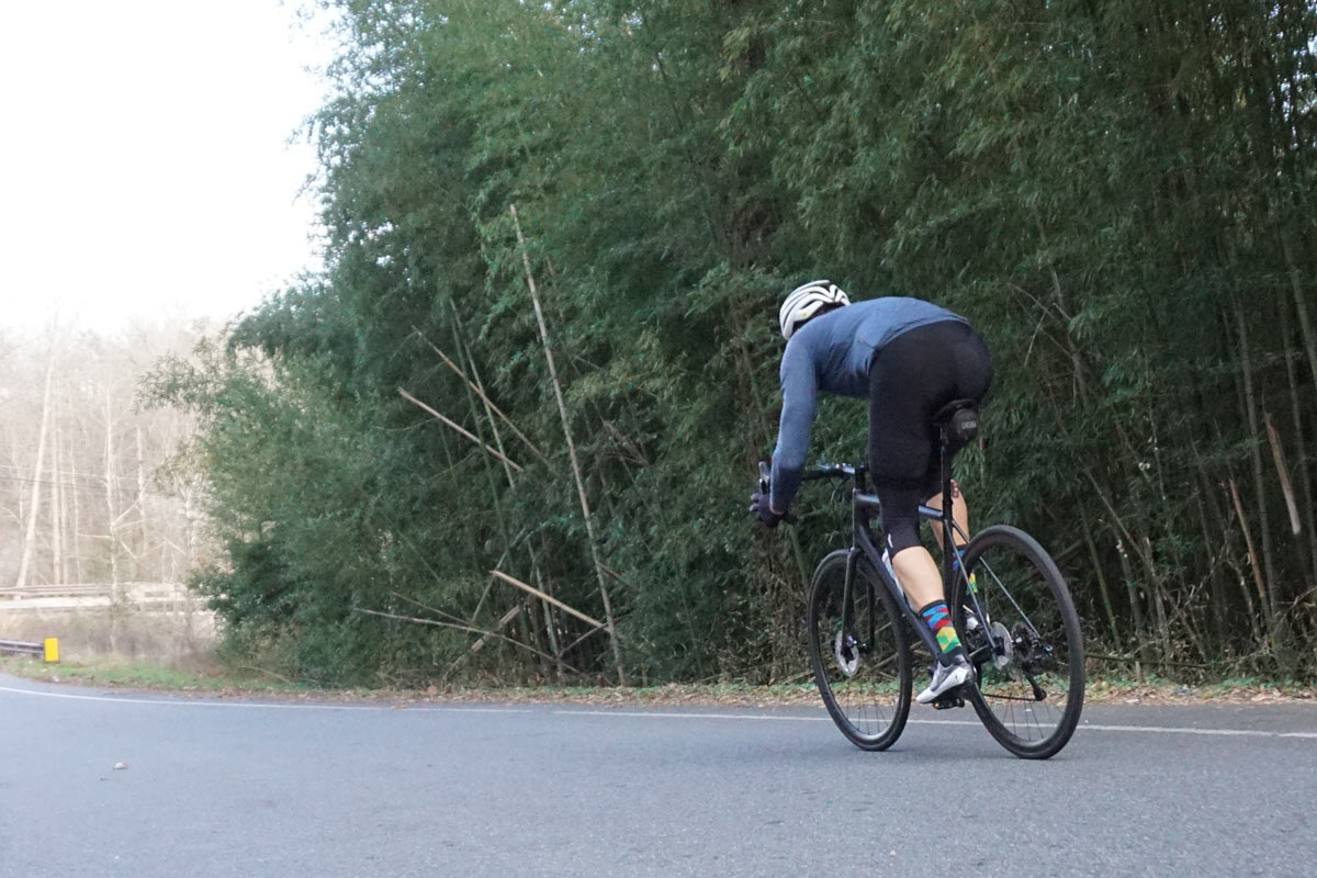 2021 specialized aethos pro lightweight road bike review and action riding photo