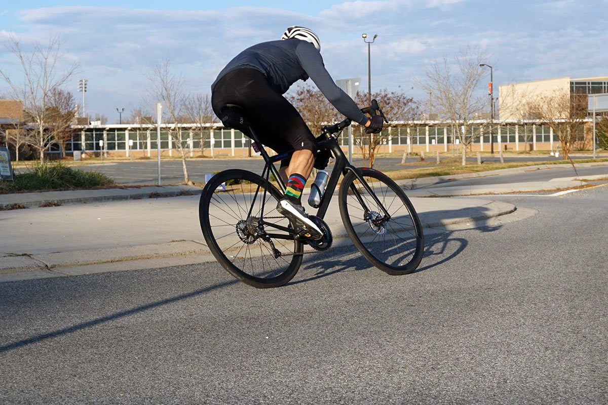 2021 specialized aethos pro lightweight road bike review and action riding photo