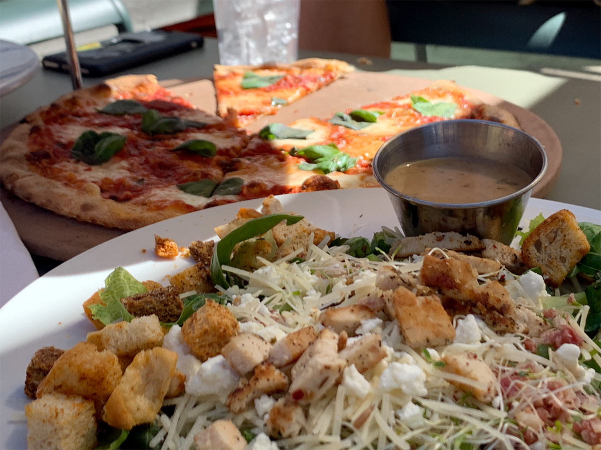 pizza and salad from pedalers pub in bentonville Arkansas