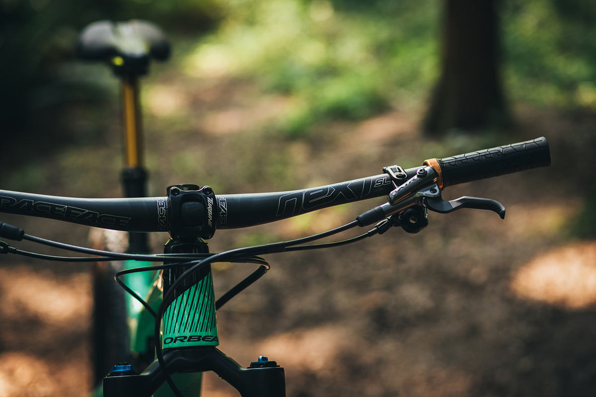 Race Face Next SL carbon handlebar shown on a mountain bike