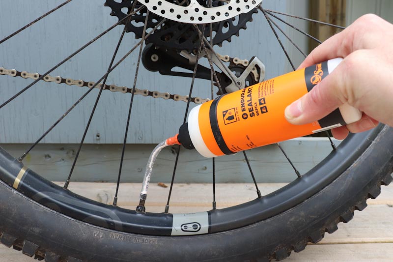 Orange Seal Endurance sealant, filling with hose