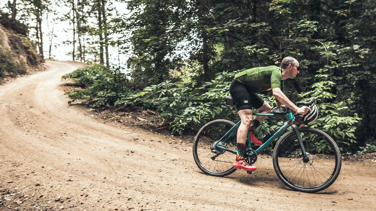 Basso Palta fast carbon gravel road bike - review: road-inspired fast, stiff, made-in-Italy, photo by Javi Echevarria Ruiz, sweeping gravel corner