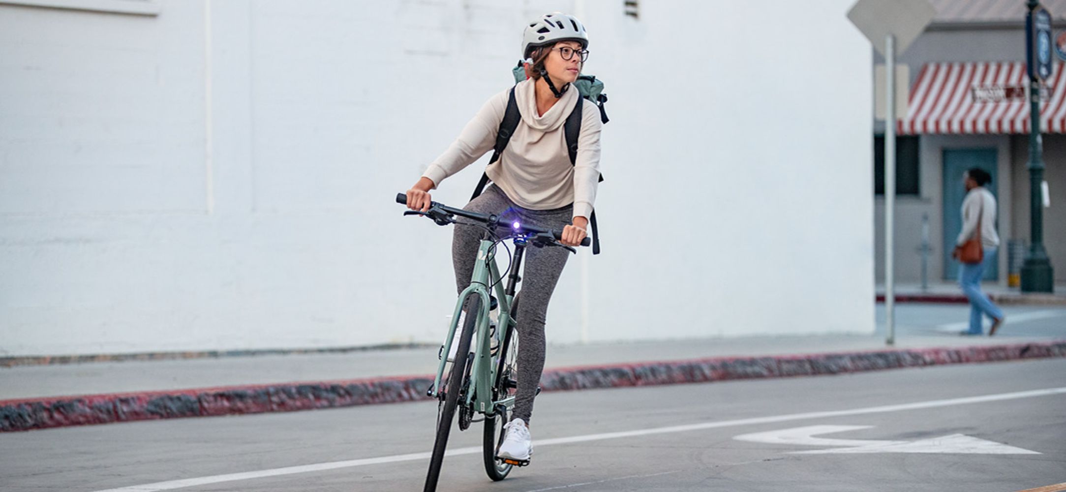 Photo of a woman riding the Alight DD from Liv Cycling, front view.