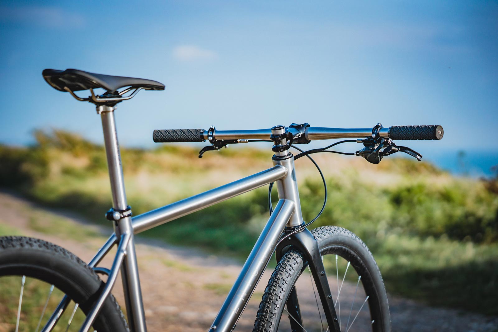 enigma flat bar escape gravel bike titanium frame long toptube