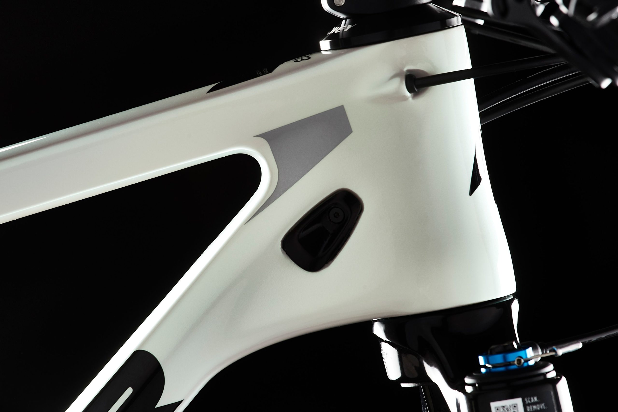 Detail view of the head tube of the Kenta in white. Side view.