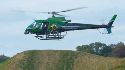 Kenny Belaey drops from helicopter on a gravel bike for 2022 Fayetteville UCI CX World Championship