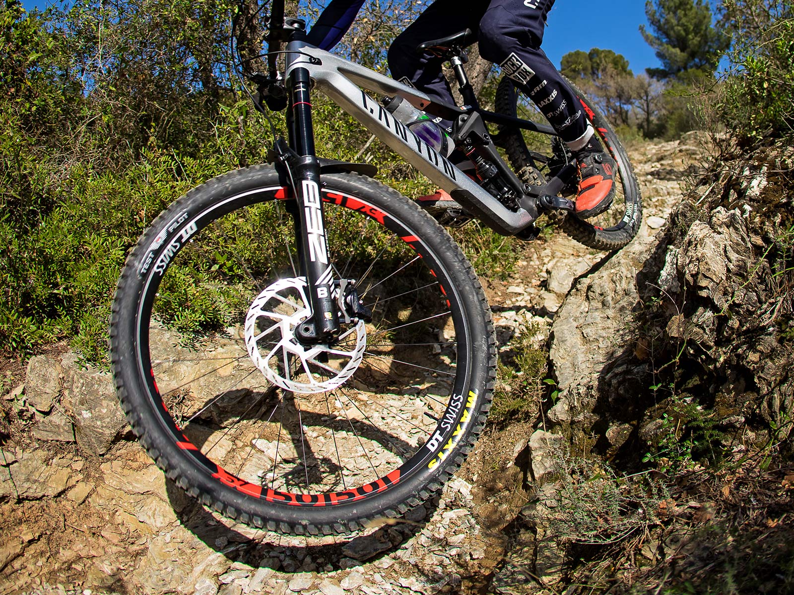 2022 Canyon Strive CFR carbon 29er enduro race mountain bike, photo by Boris Beyer, riding detail
