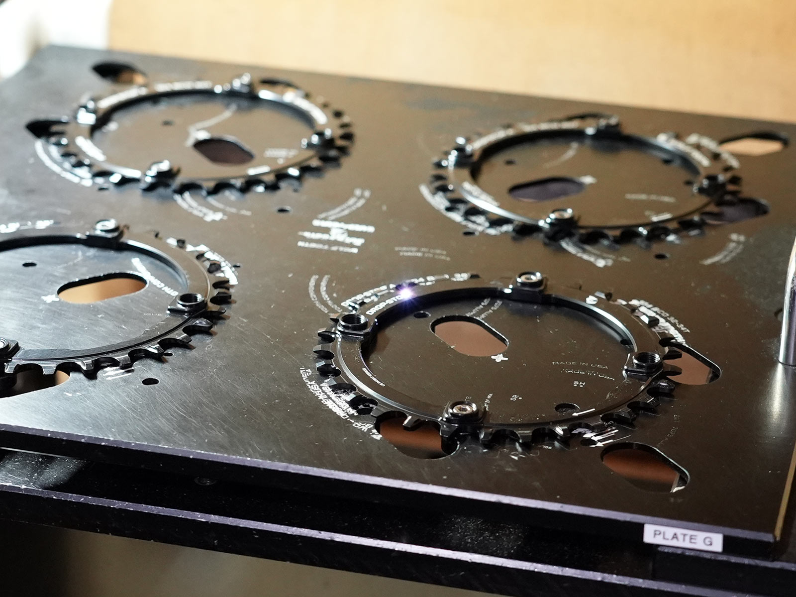 wolf tooth factory tour laser etching bicycle components