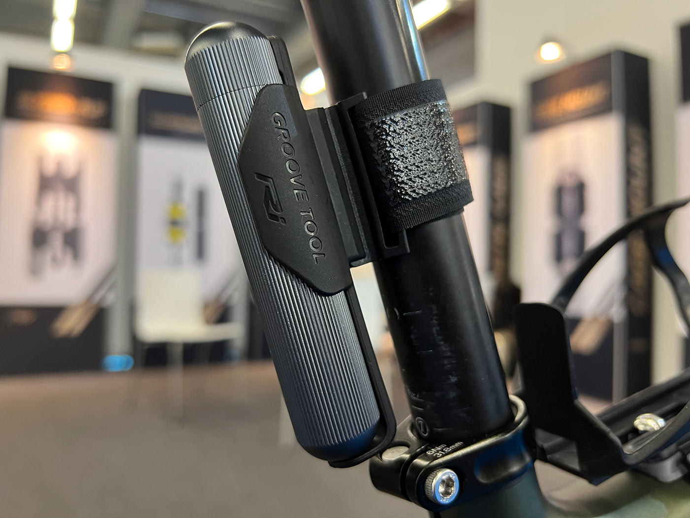 ryder groove tool pro shown clipped into the seatpost mount