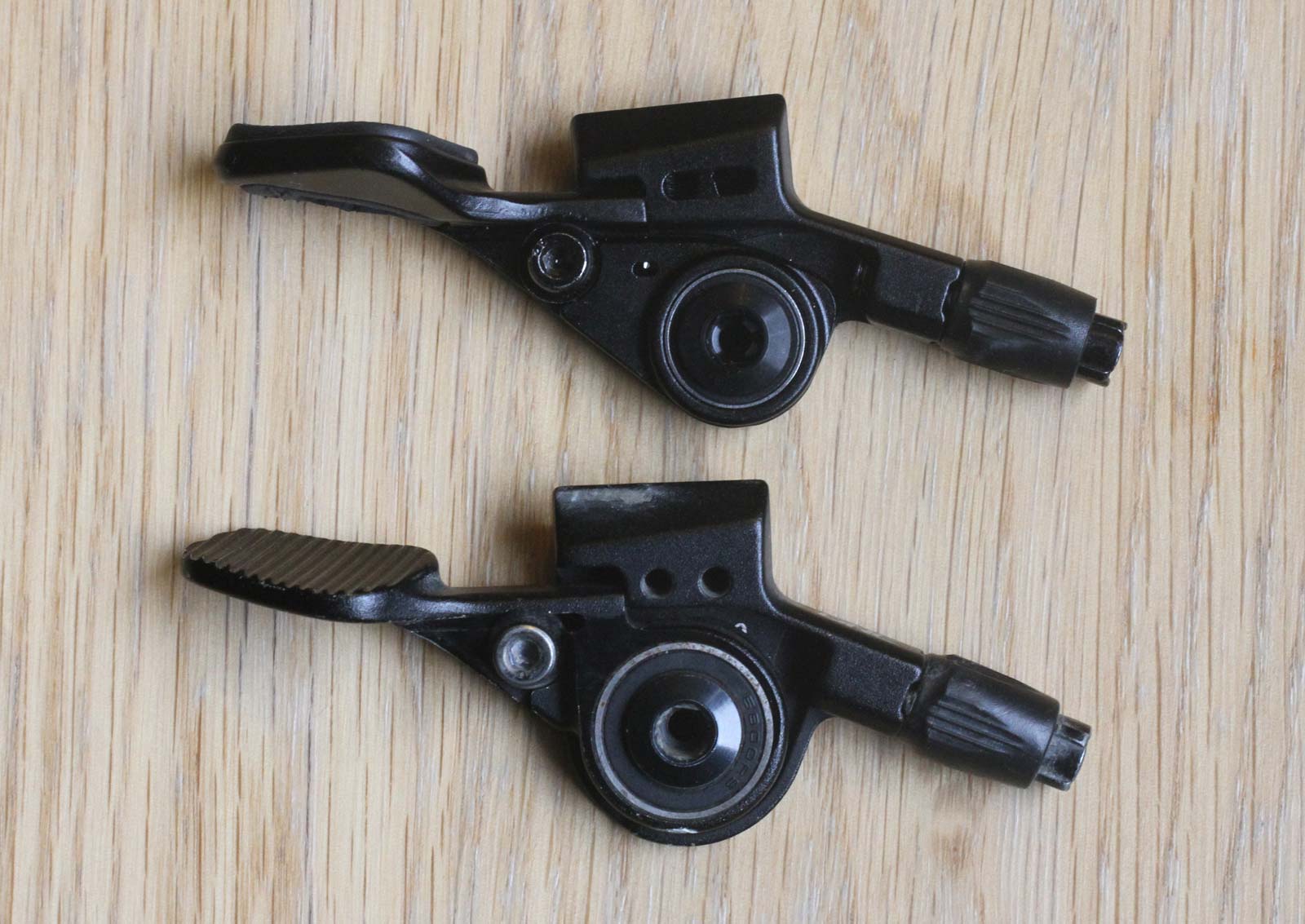 side by side comparison v2 versus v3 oneup dropper remote