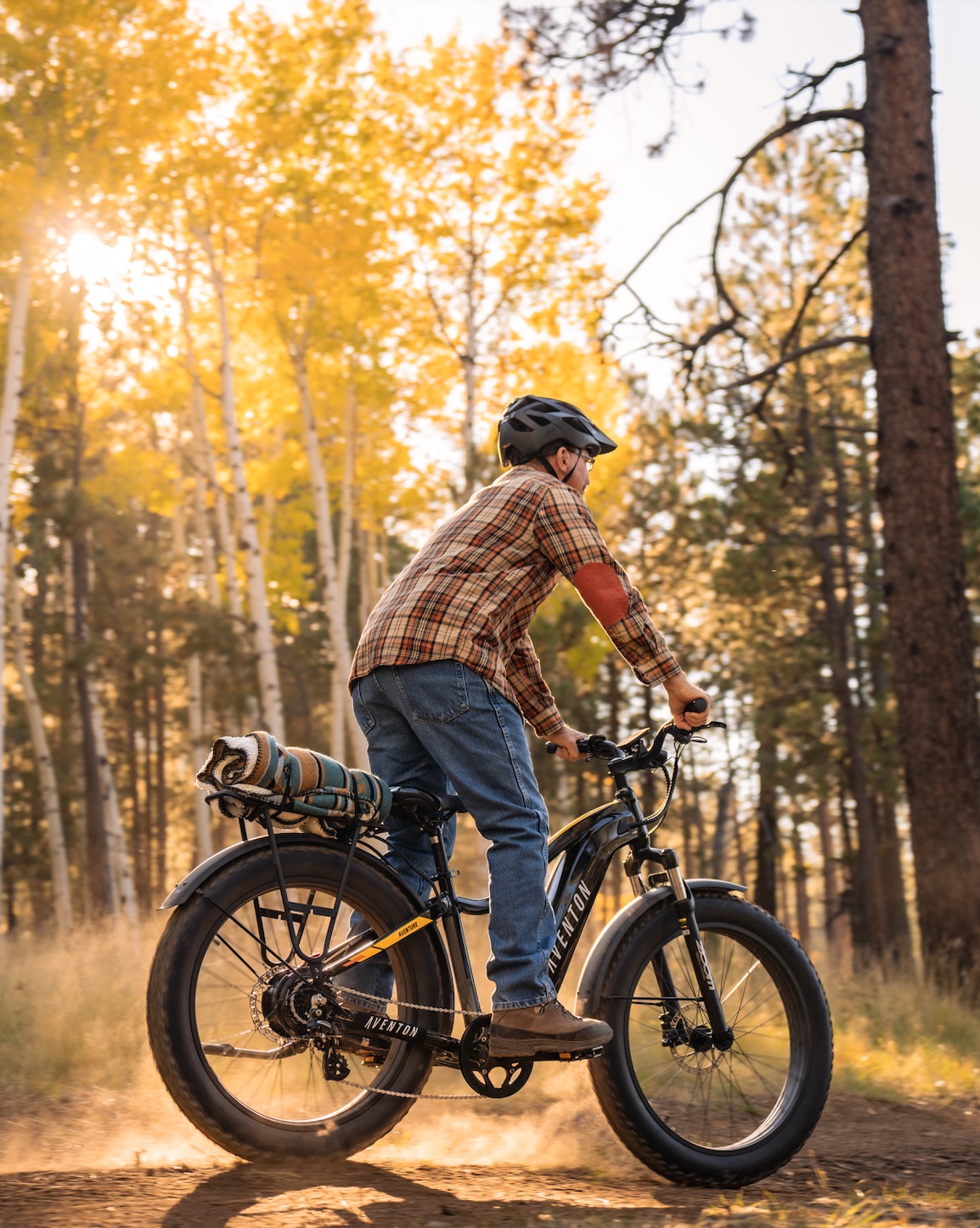 Man riding Aventon Aventure bike.