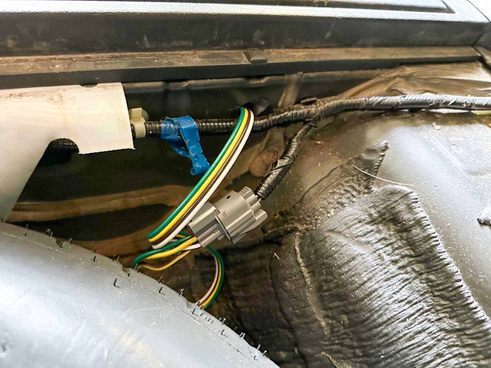 wiring harness connector inside spare tire well