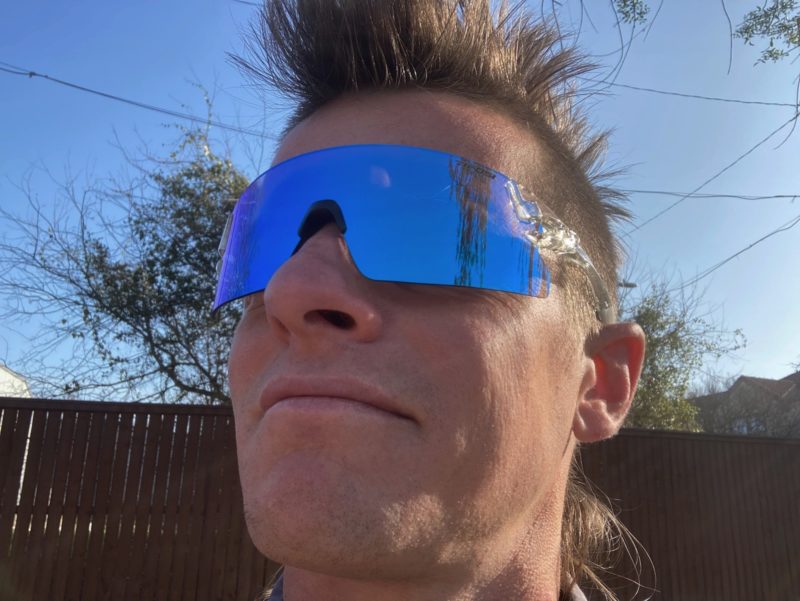 man wearing the tifosi rail xc crystal clear fototec 