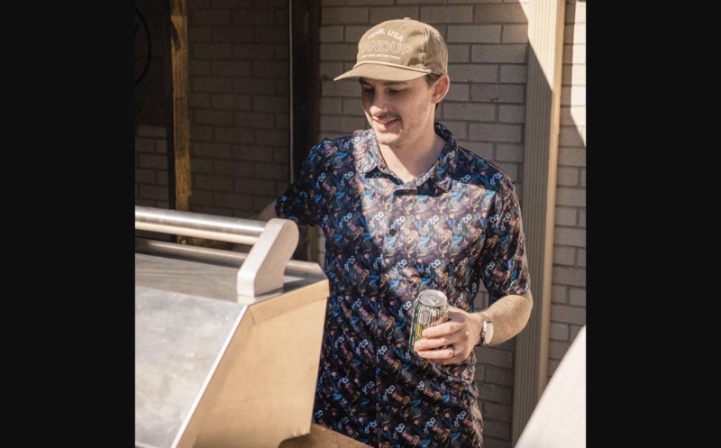 man grilling in a hawaiian shirt