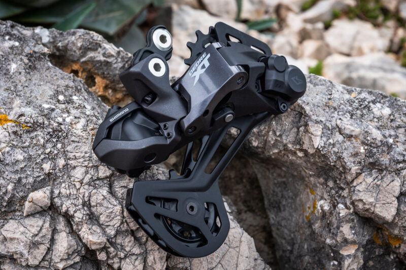 Next-gen Shimano eMTB ebikes transformed with AutoShift FreeShift automatic shifting, powered by LinkGlide, EP-801 & 11sp XT Di2, photo by Dan Milner