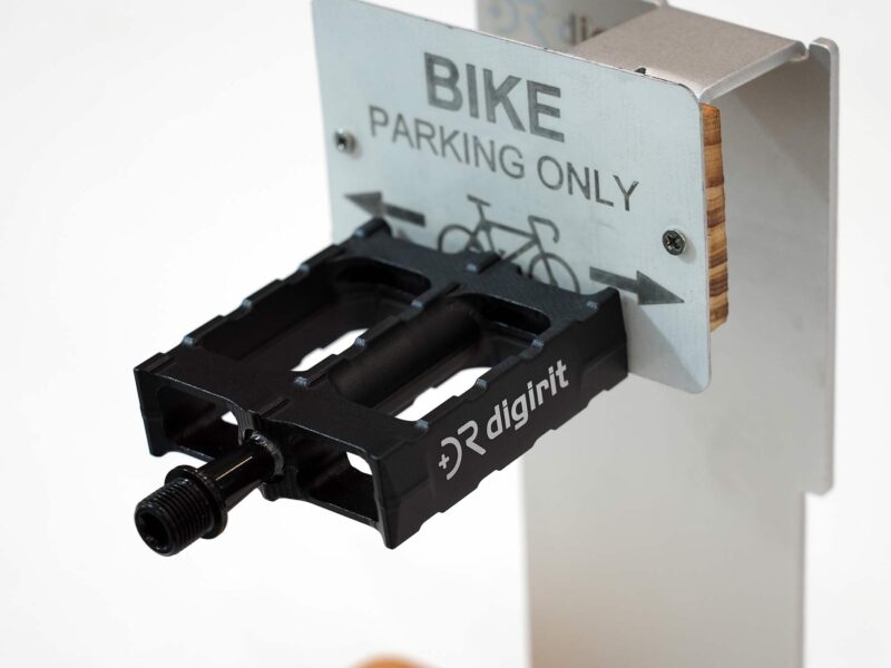 magnetic bicycle pedals that hold the bike against metal racks and rails