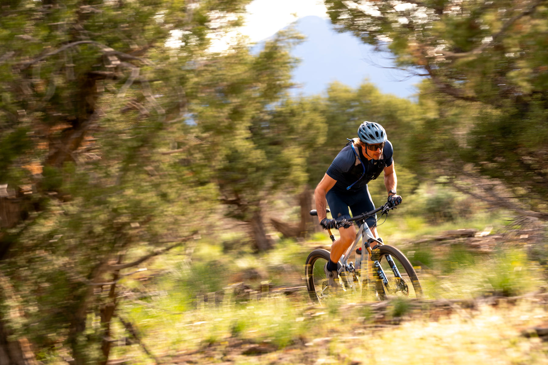 riding action of pivot mach 4SL xc mountain bike