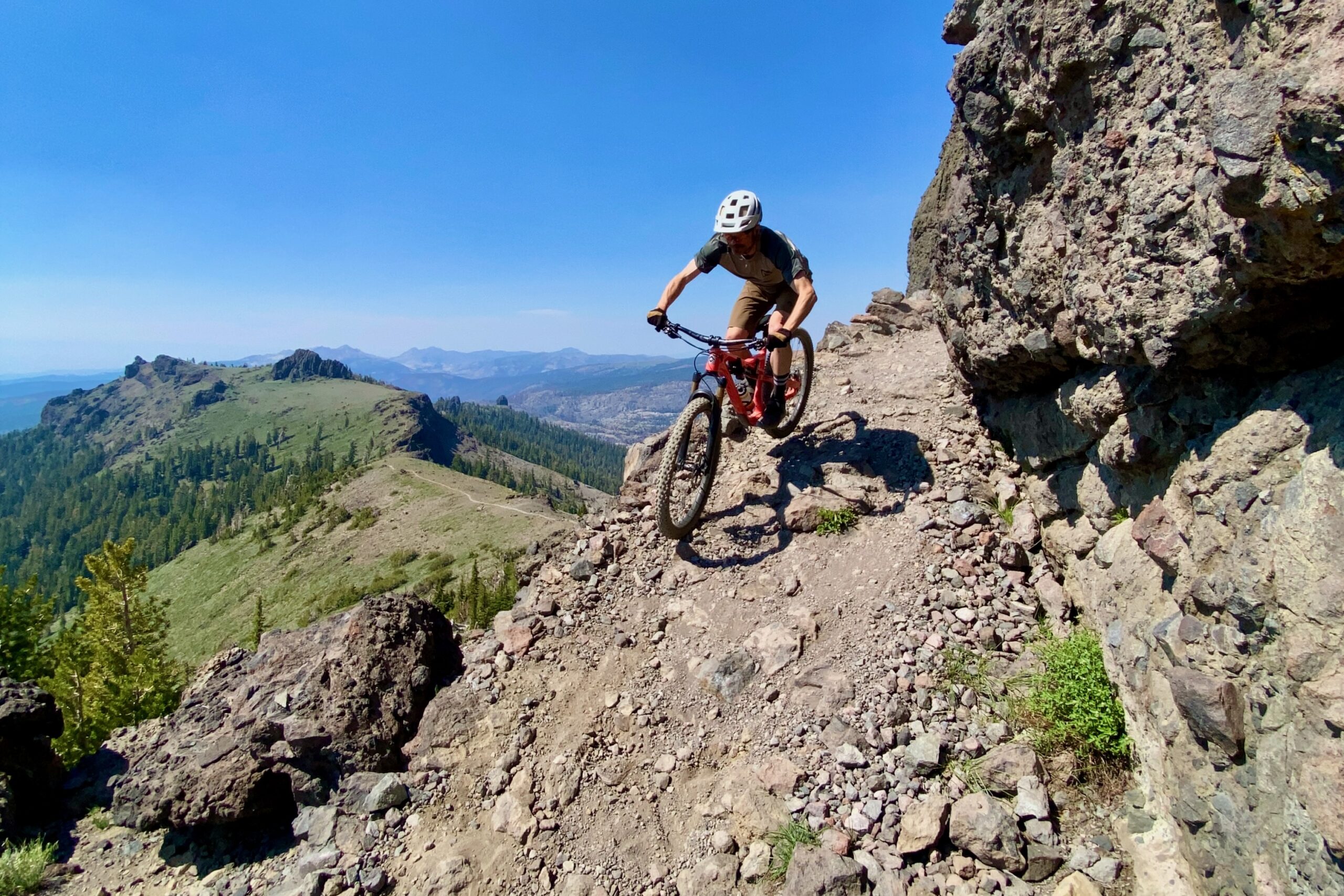 riding a rocky trail while testing MTB shoes