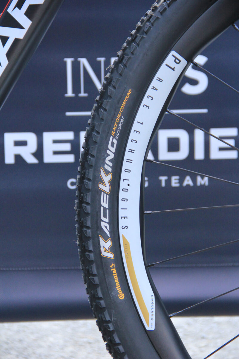 tom pidcock pro bike check pinarello dogma xc hardtail continental race king tires