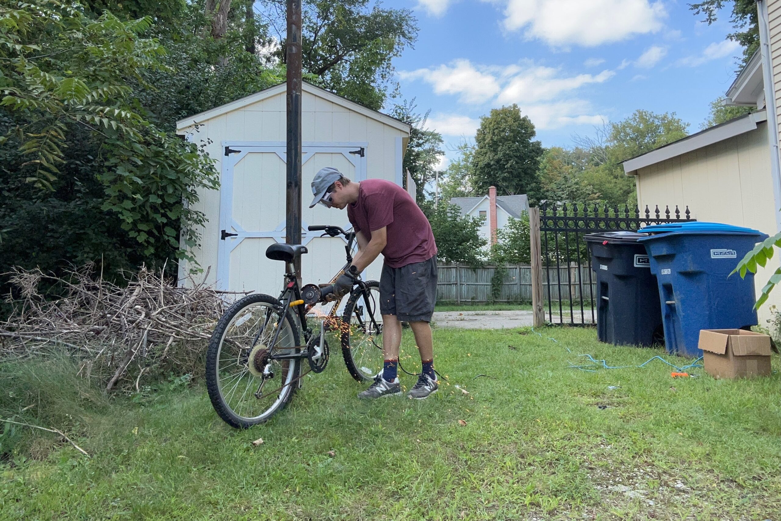 Cutting a bike lock with an angle grinder during bike lock testing