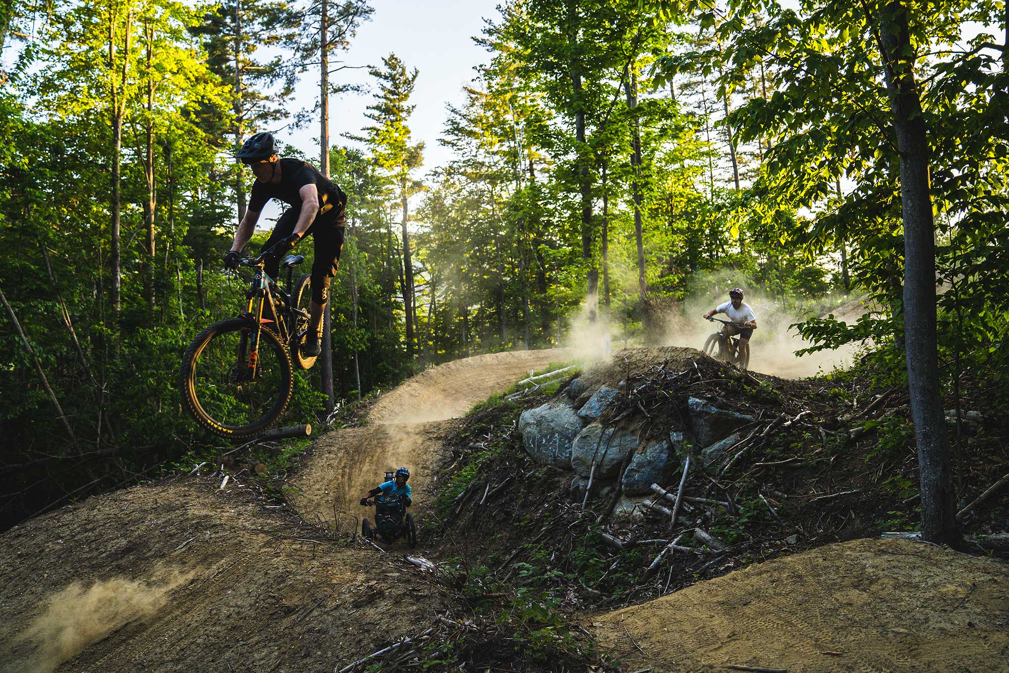 riders on driving range adaptive mountain bike trails in vermont