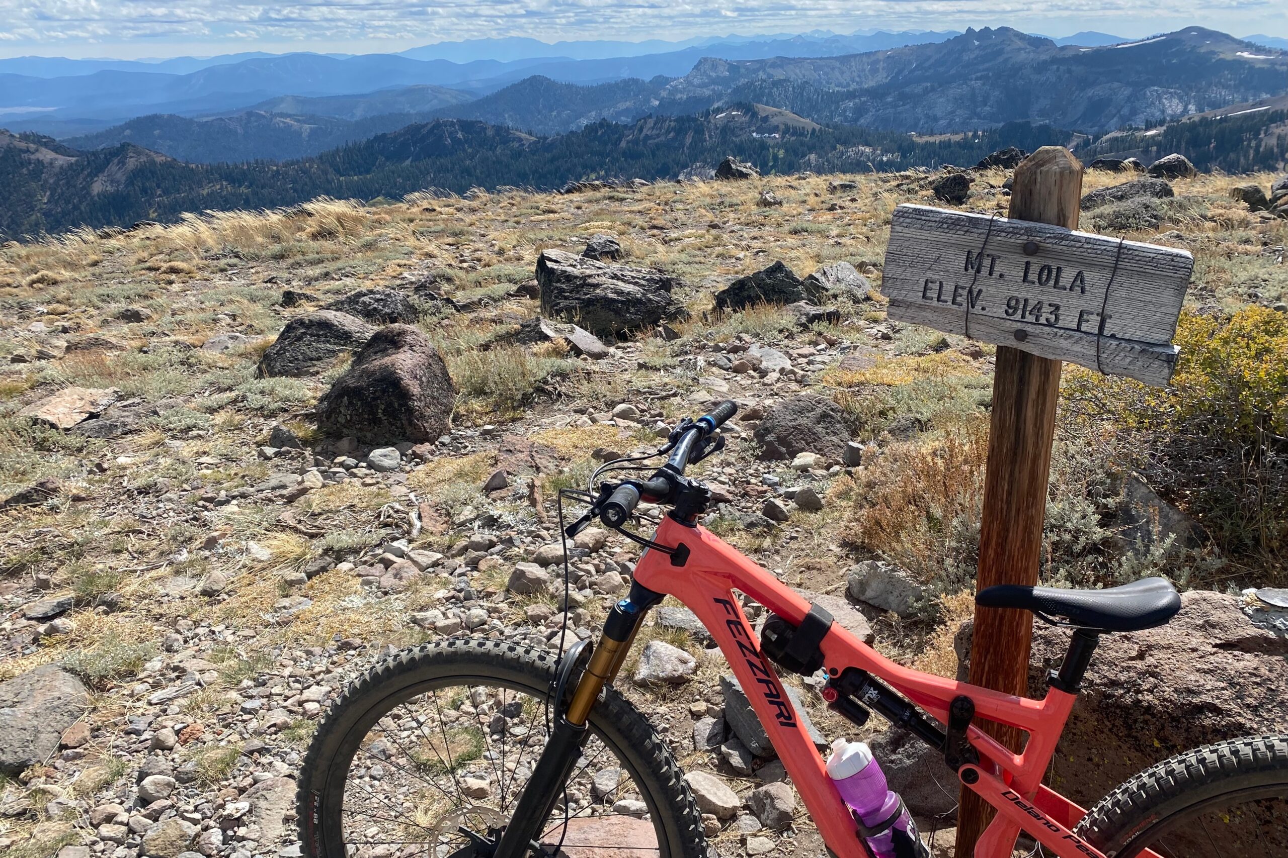 The Blackburn Switch Wrap Tool Kit mounted on a mountain bike on a mountaintop