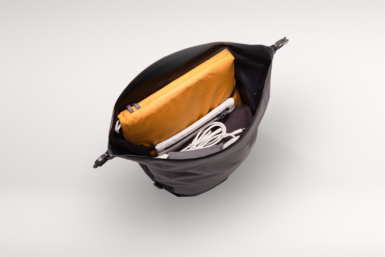 Tailfin 16-liter Pannier launch laptop holster in action