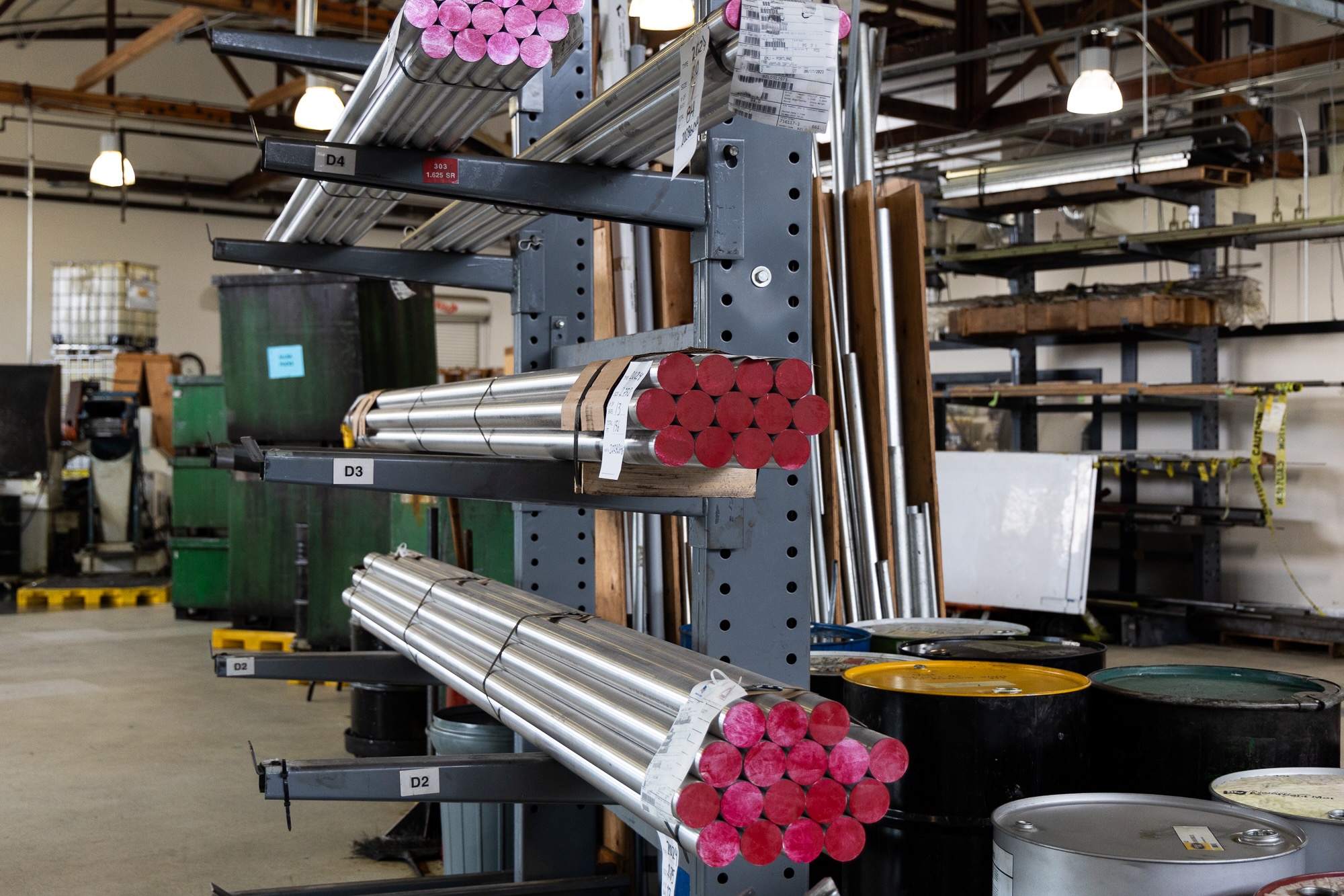 Shelves of aluminum stock rods that are the raw materials that will be turned into components at the Chris King Factory