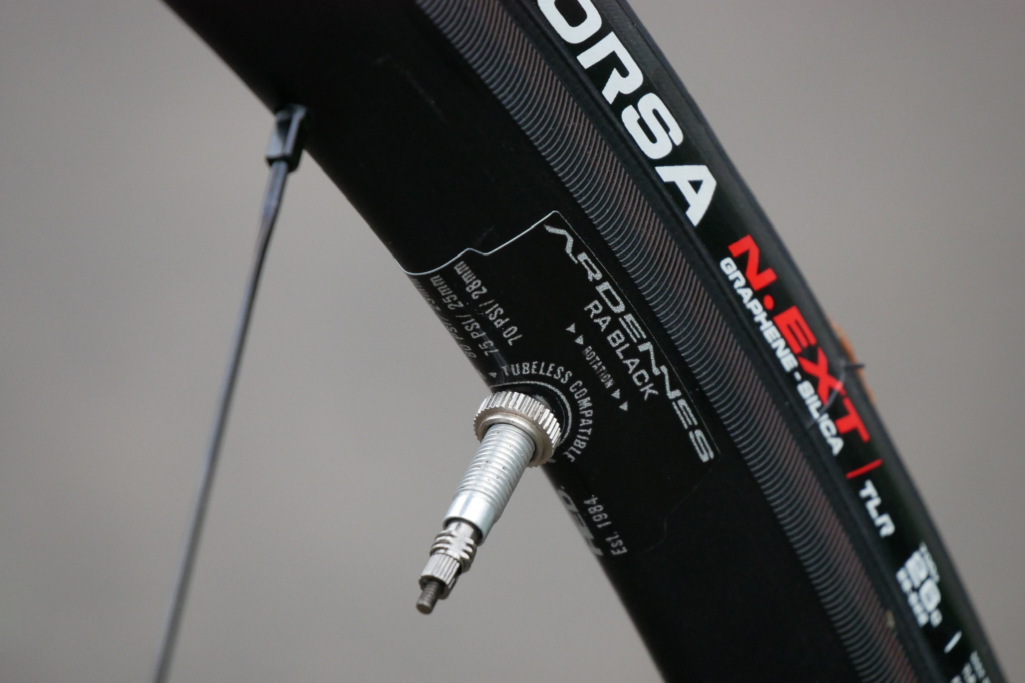 A close-up look at the textured brake track on the HED Ardennes RA Black road bike wheels