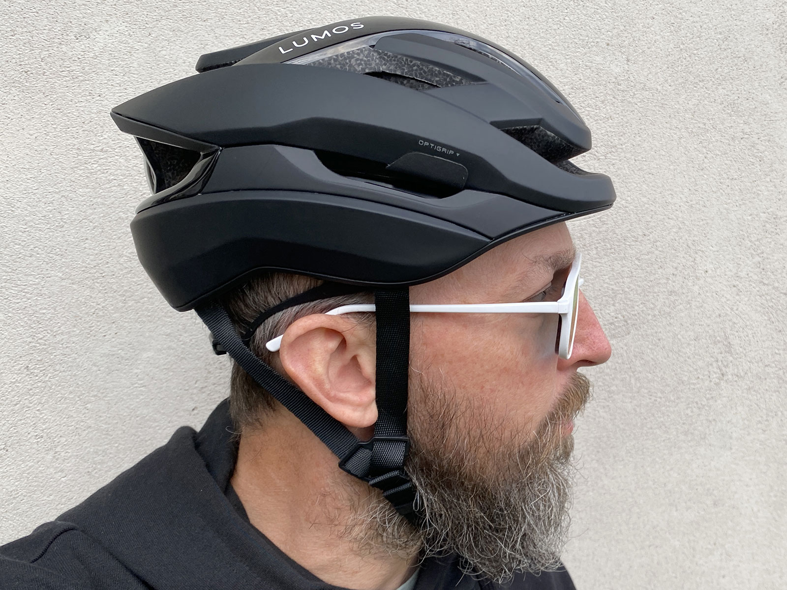 Lumos Ultra Fly Pro MIPS performance road helmet with built-in Firefly taillight, side