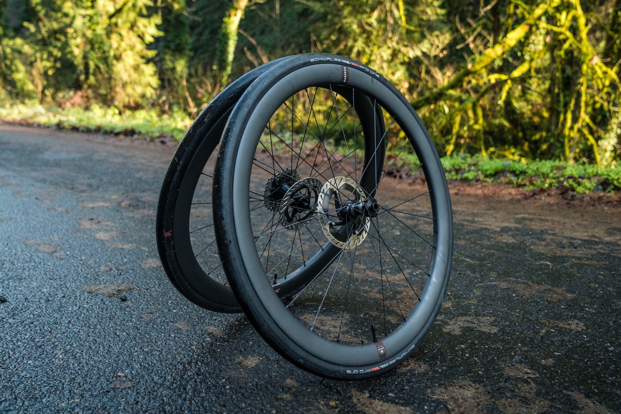 Glamous shot of the Reserve 40|44 road wheels leaning against each other with tires mounted.