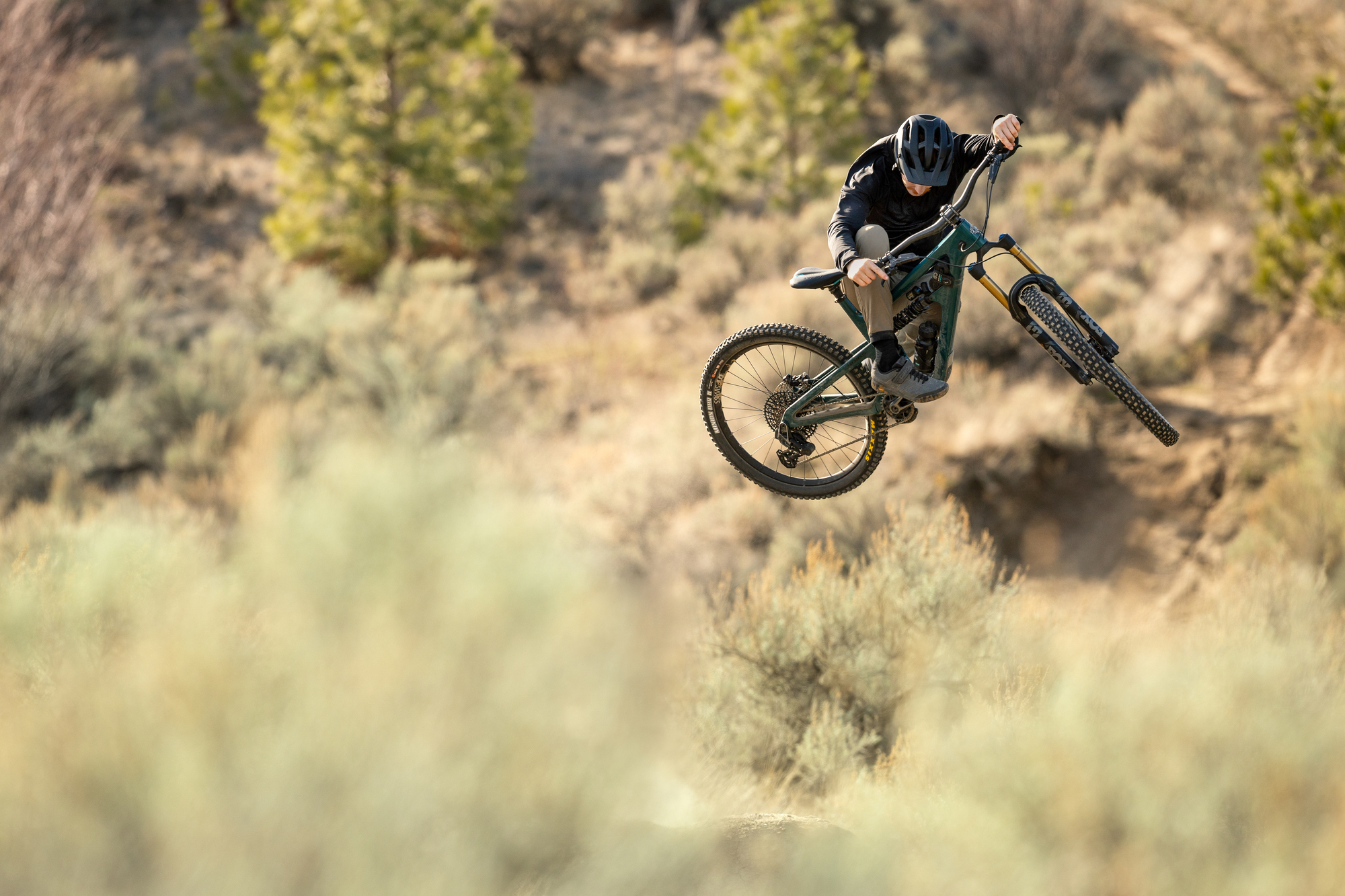 Jubal Davis jumping on the new Yeti SB165 in a stock action photo