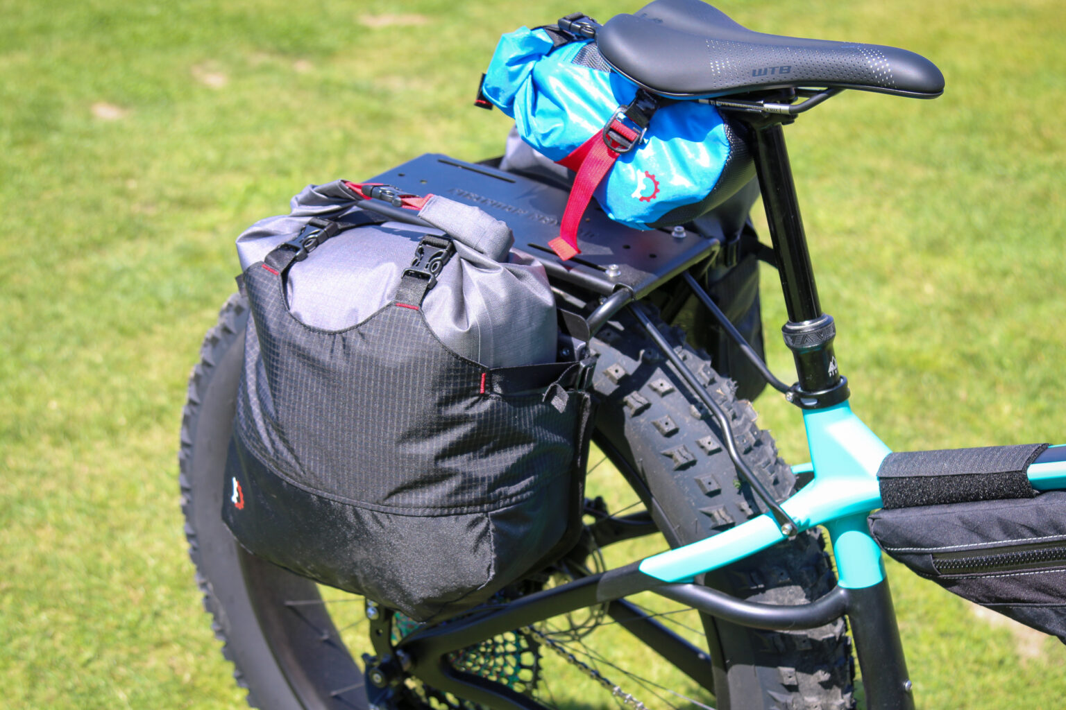 Corvus Akio adventure fat bike Revelate cargo cage pannier prototype