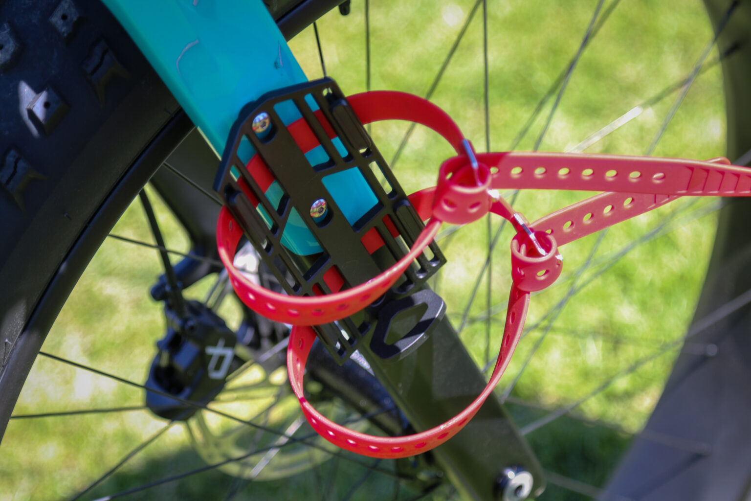 Corvus Akio adventure fat bike Revelate cargo cage pannier prototype