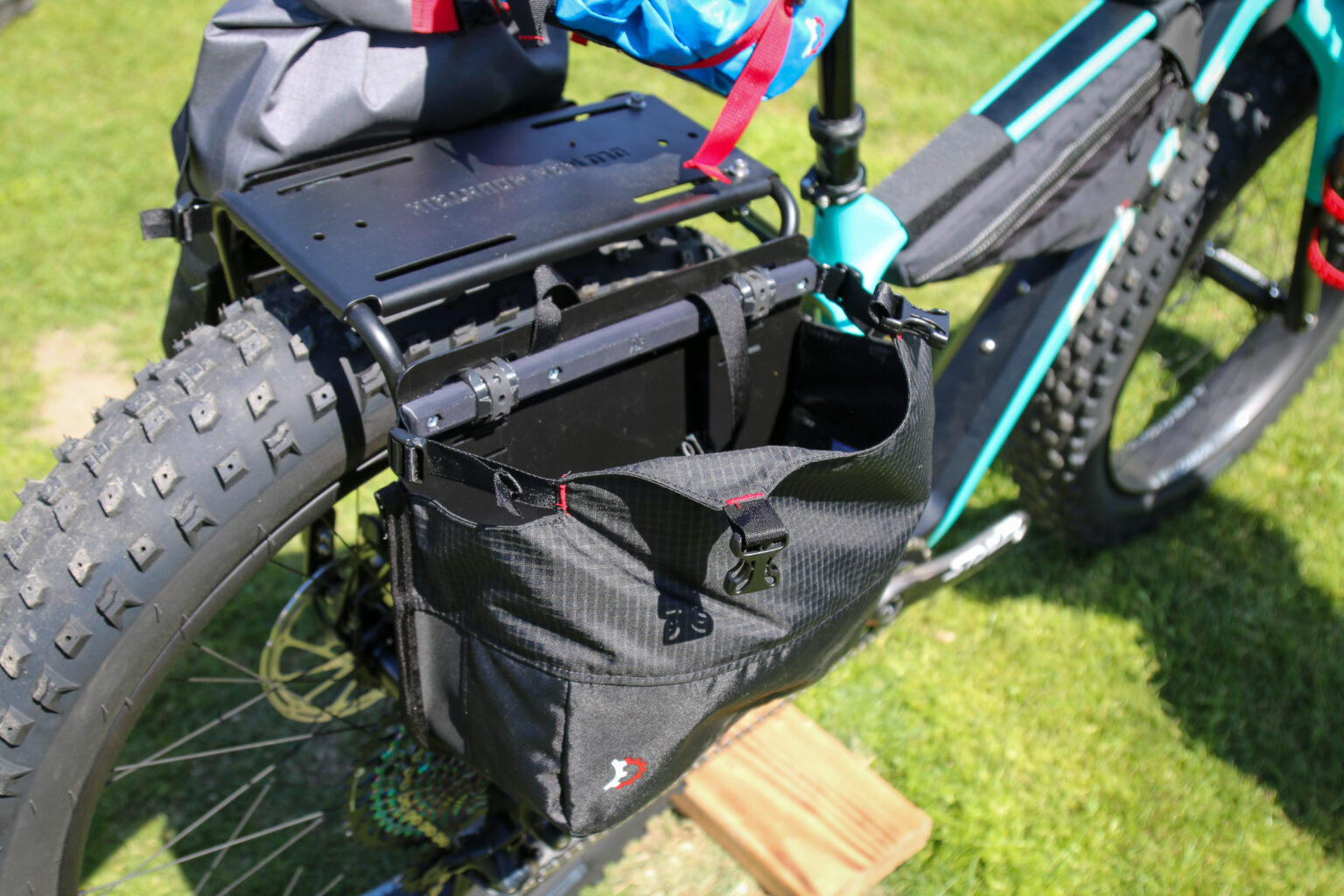 Corvus Akio adventure fat bike Revelate cargo cage pannier prototype