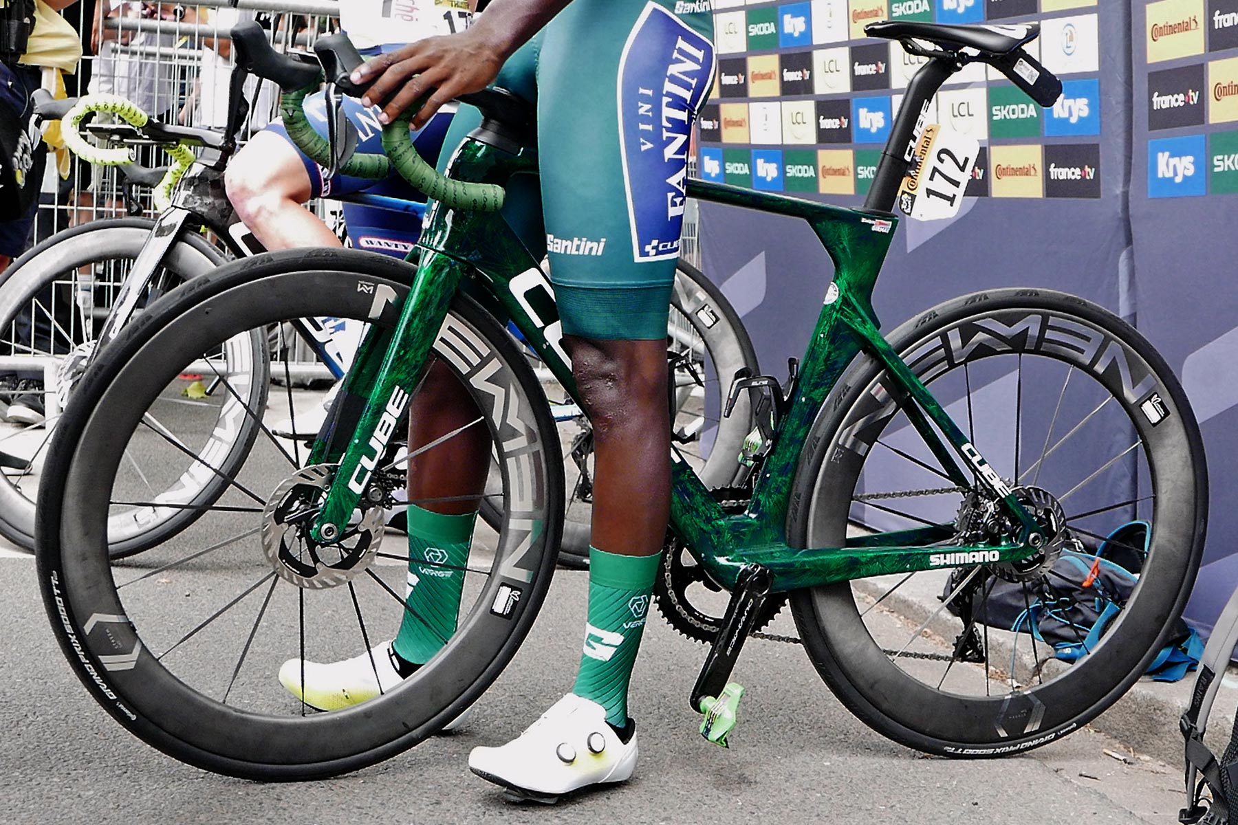 Biniam Girmay 2024 Tour de France Green Jersey winner on Cube Litening Aero TE C:68X aerodynamic road bike at the start of Stage 10
